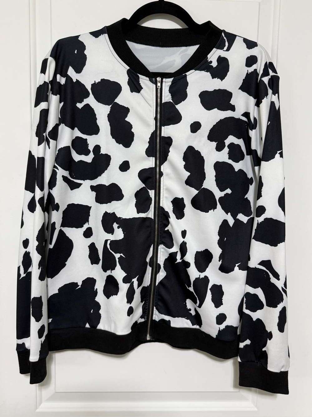 Women's Black & White Cow Print Bomber Jacket